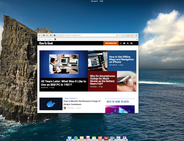 Elementary OS 6 desktop with web browser displaying HowToGeek.com