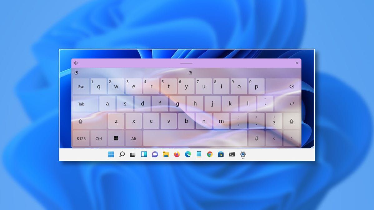 A Windows 11 touch keyboard with a theme applied.