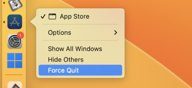 Hold the "Option" key to force quit the Mac App Store