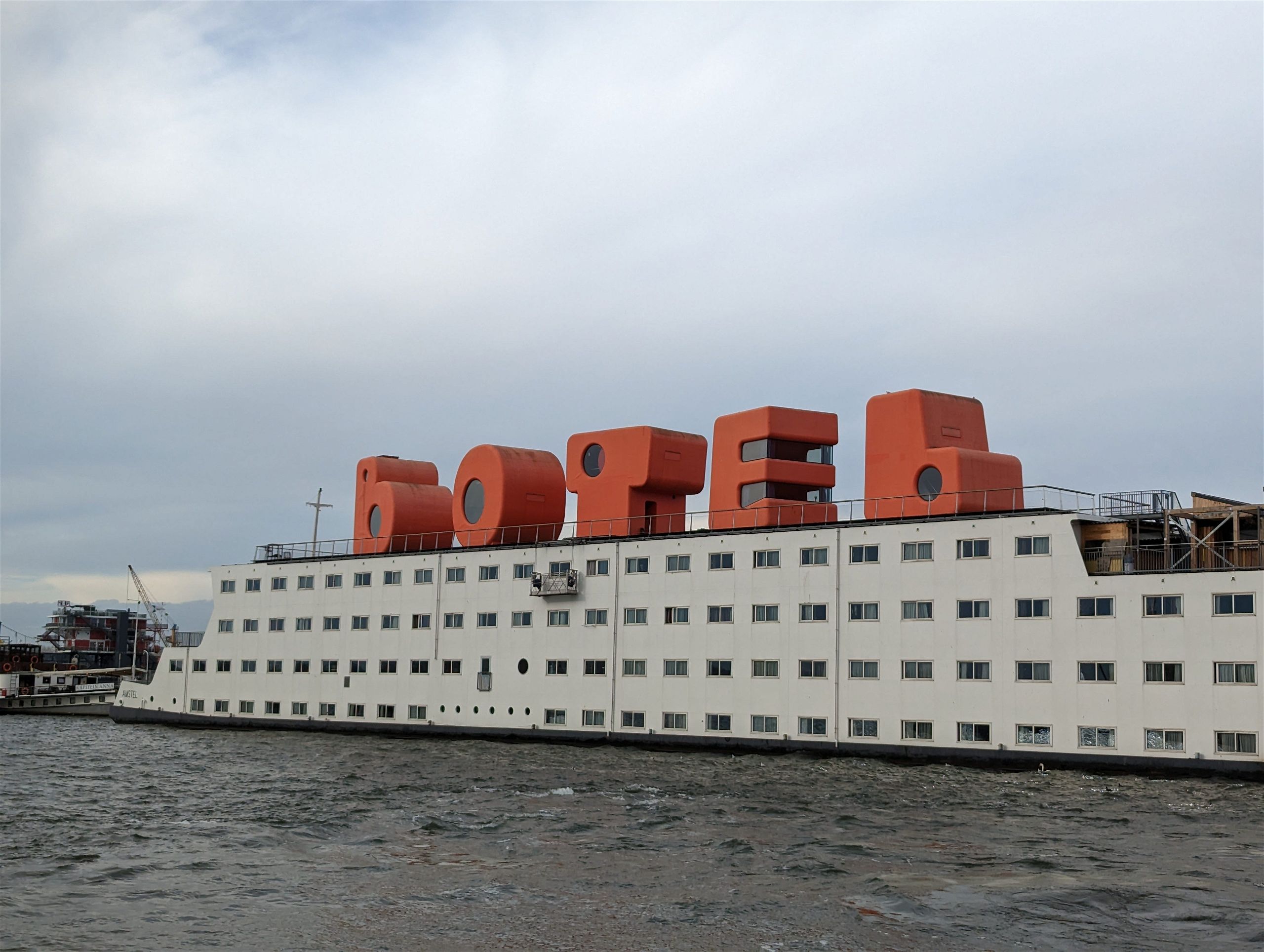 A boat with the word "Botel" on top